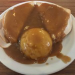 Turkey and gravy being served on a white plate at Village Kitchen in Angola, IN